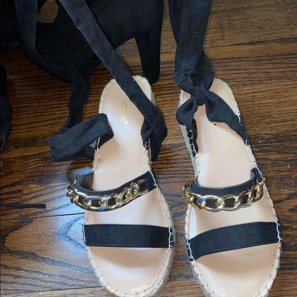 Black and gold sandals